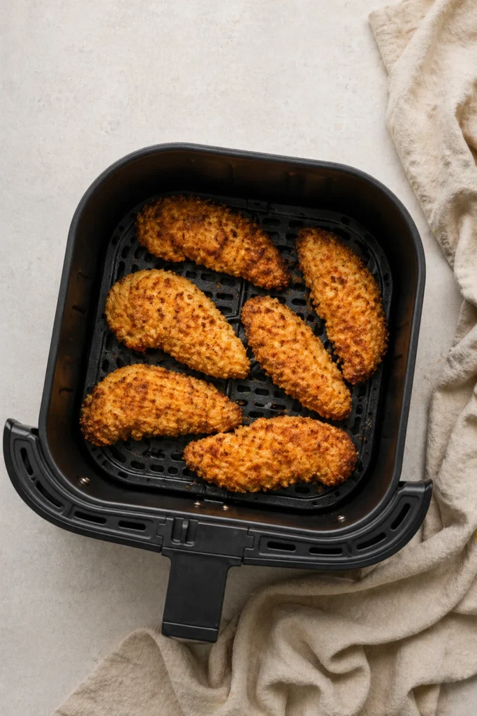 Golden crispy chicken tenders cooked in the air fryer